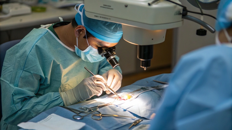 Expert opthamologist performing advanced Vitreoretinal eye surgery